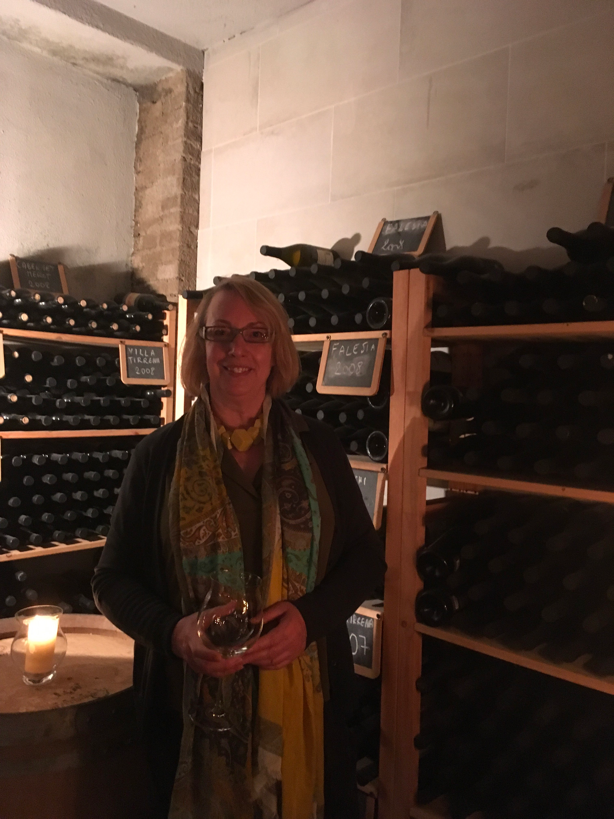 Sue Addis in a wine cellar