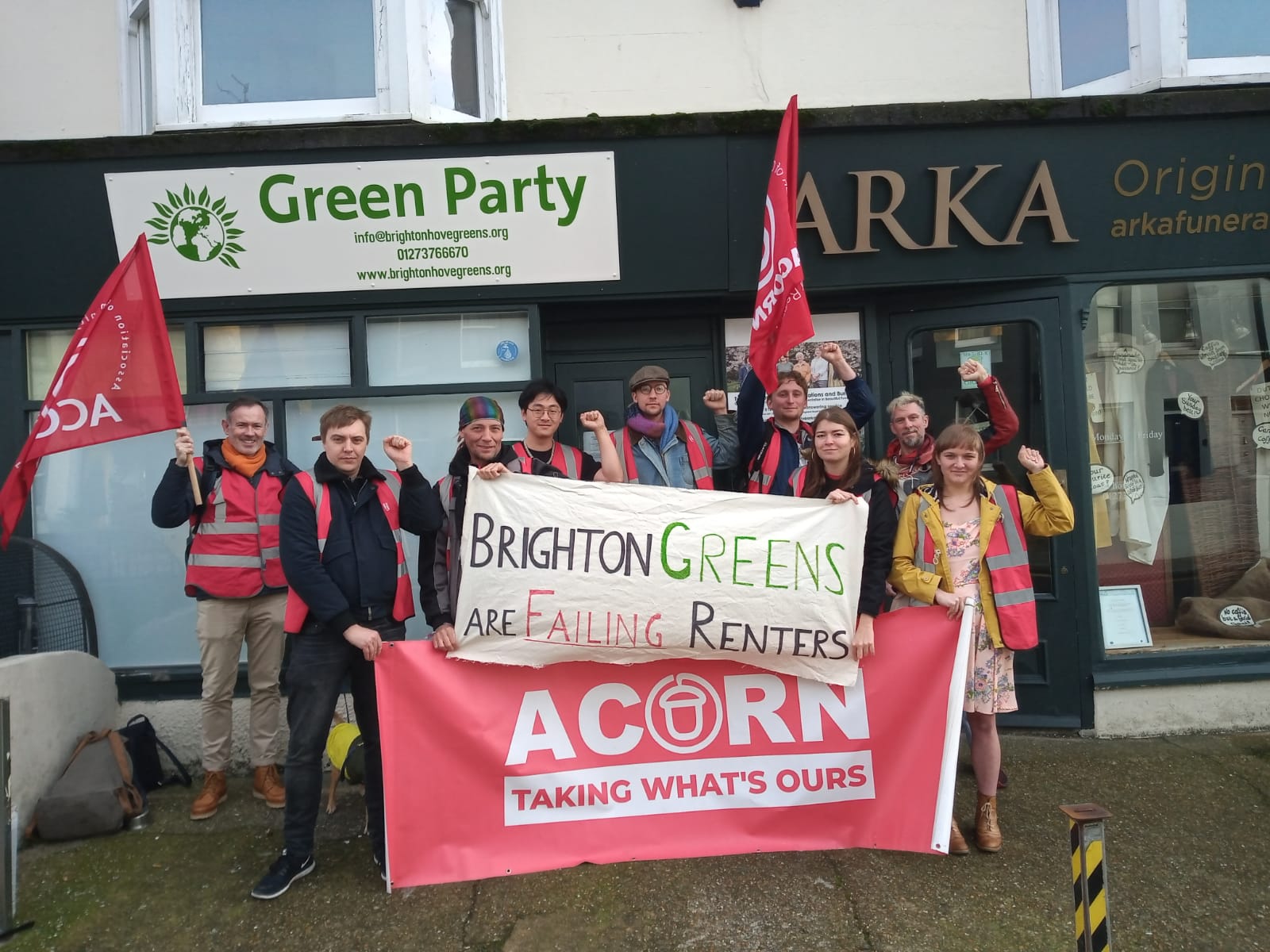 A picture of ACORN members protesting outside the Green Party office