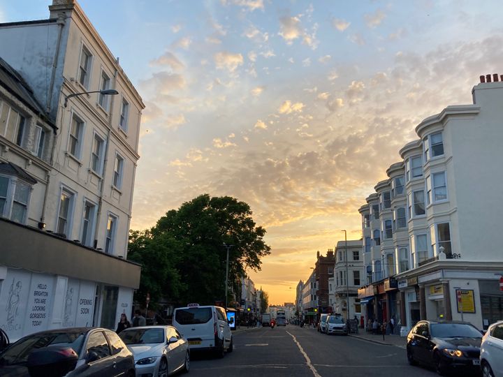 Photo of the sunset looking down Western Road towards Hove from Norfolk Square