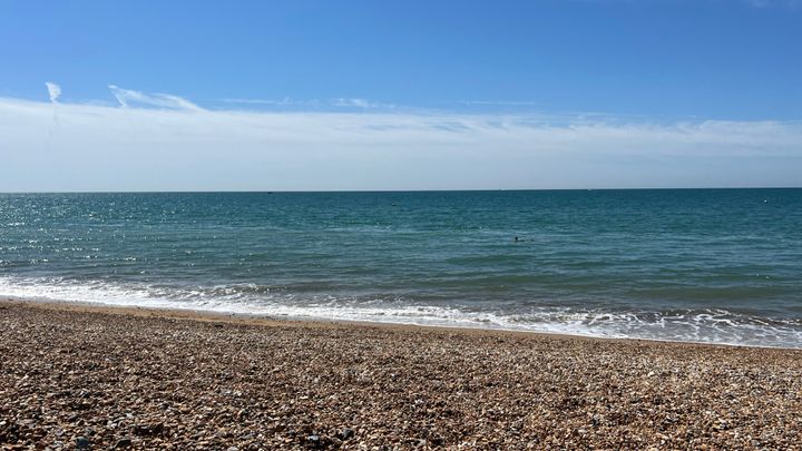 A picture of the beach leading down to the sea at Black Rock