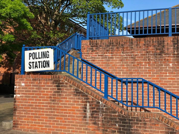 Picture of a sign saying "Polling Station" outside a polling station