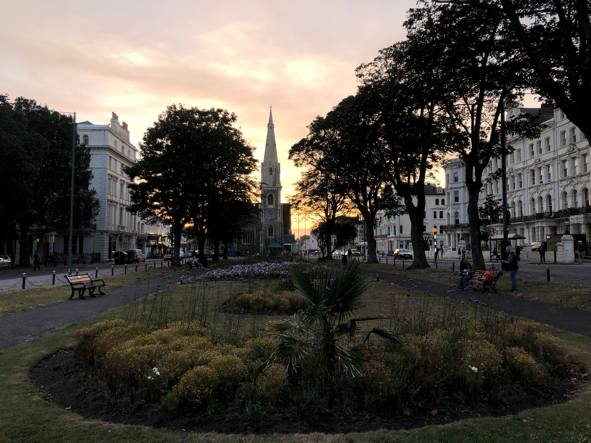 Picture of the sun setting by Madeira Square