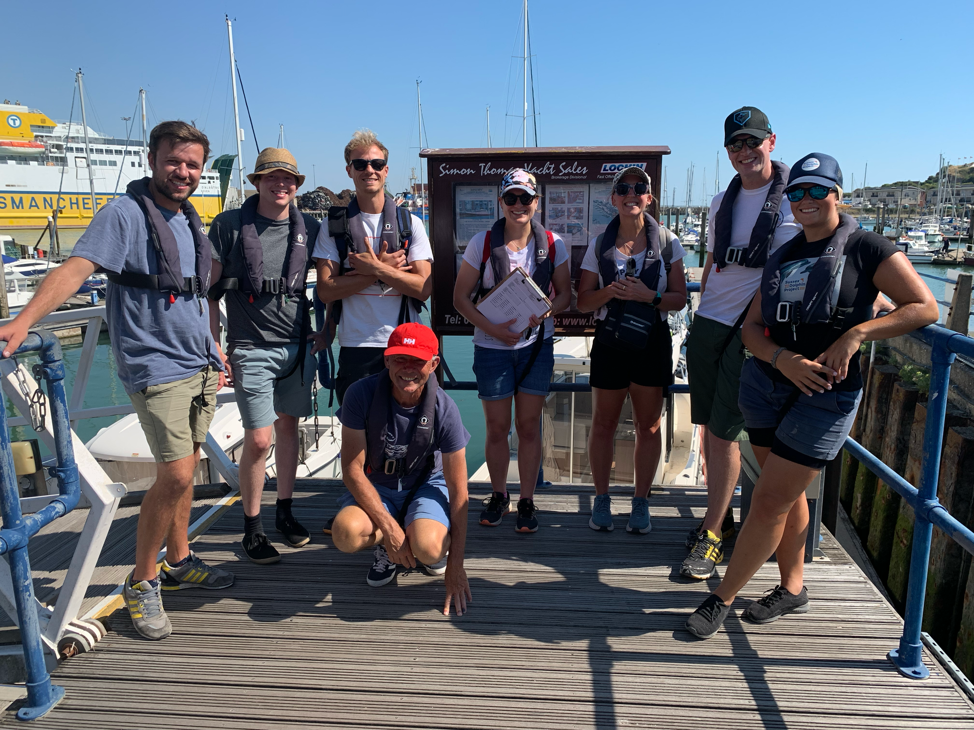 A photo of the team taken at Newhaven just before they went out on a research boat trip this summer.