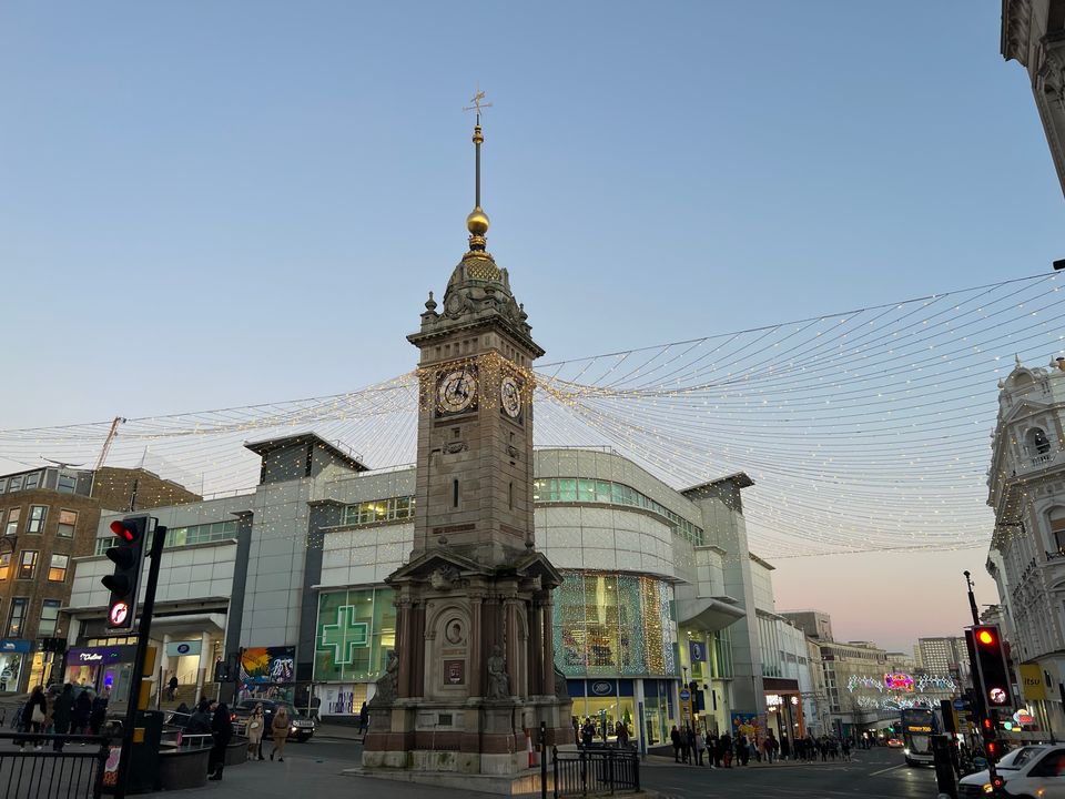 Picture of the Christmas decorations on the Clock Tower with a soft sunset in the background